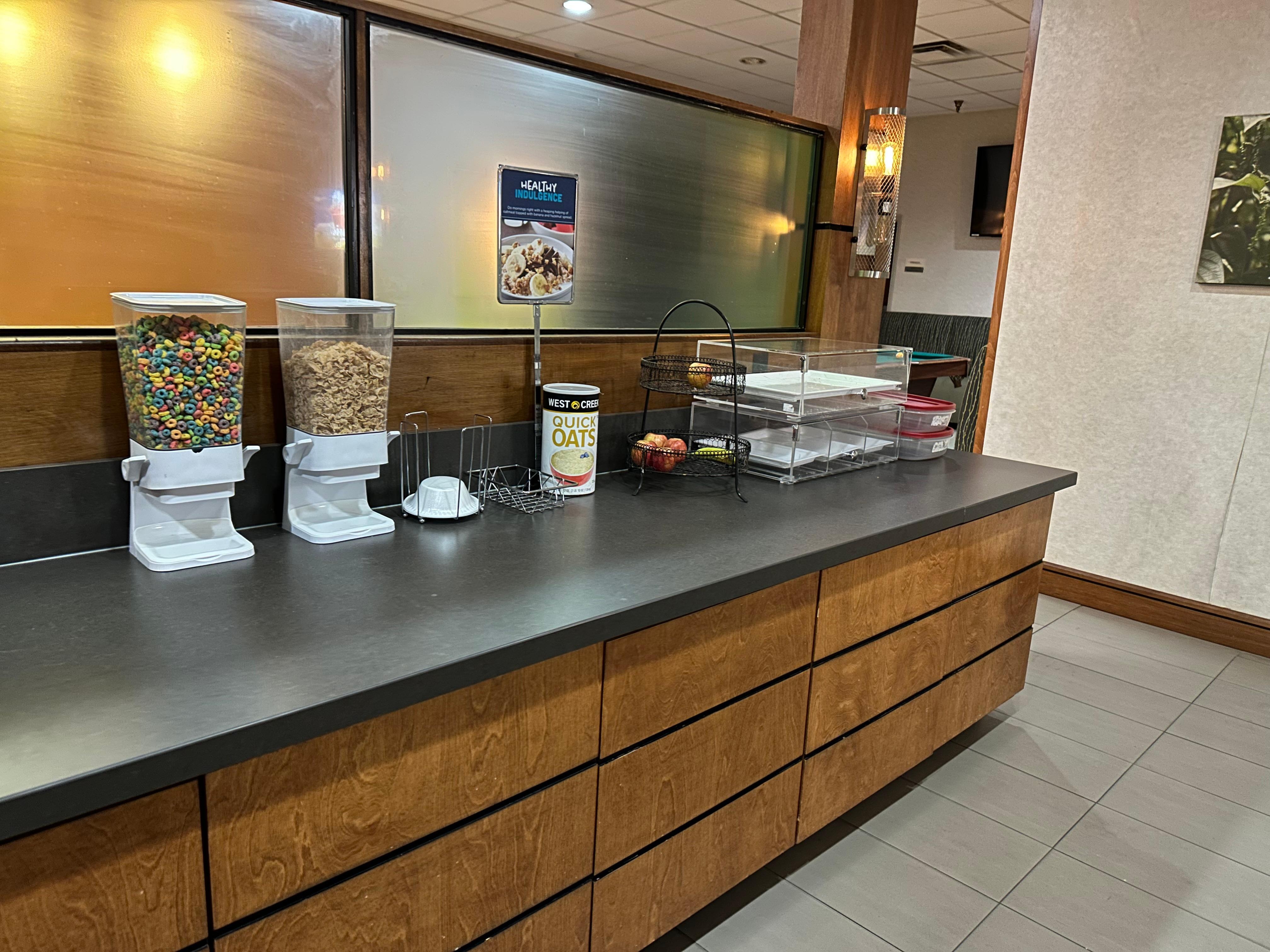 There was no bread. No muffins, no milk. The old orange juice was settling in the bottom of the machine. Where someone might have overflowed it.