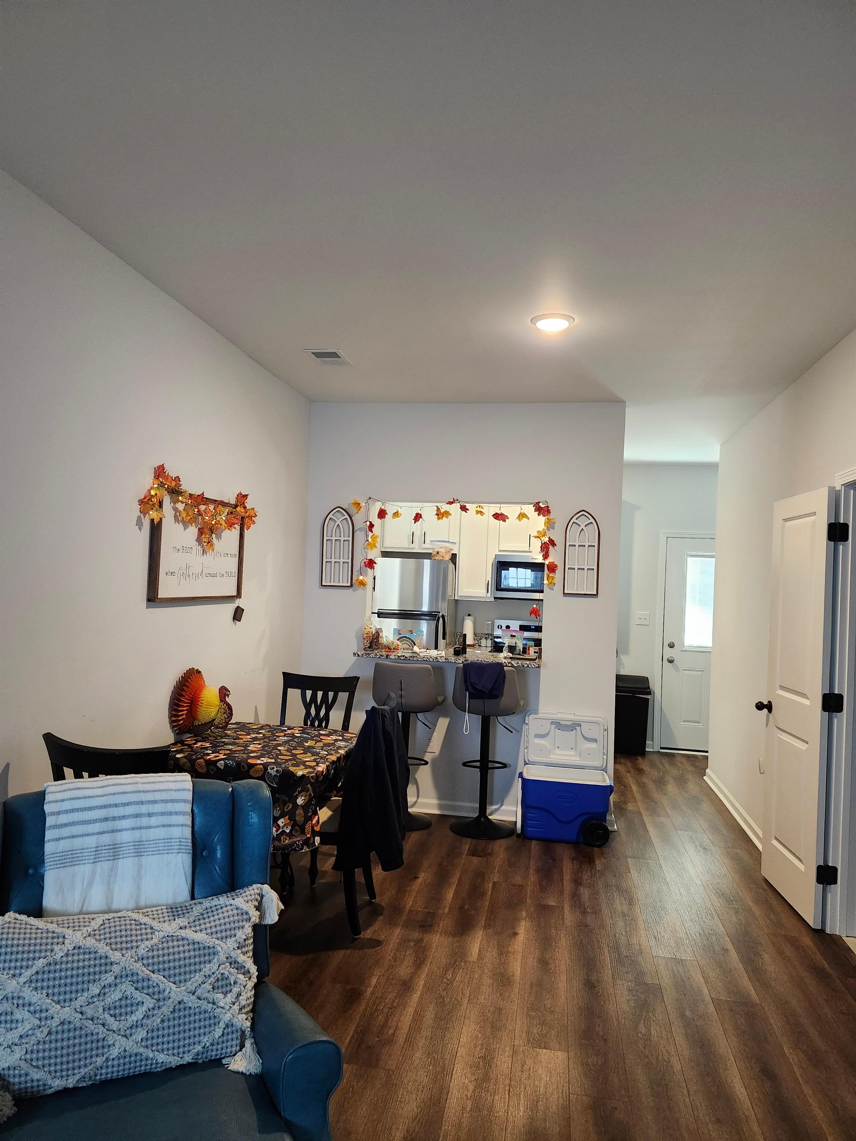 Living/Dinning with fall decorations.