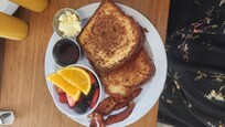 French Toast with a side of bacon from cafe