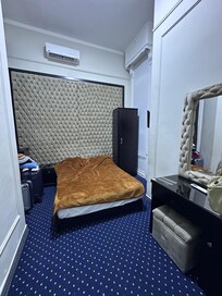 Fridge, closet, vanity. Only one outlet by the fridge. The other one was by the entrance door… quite high.