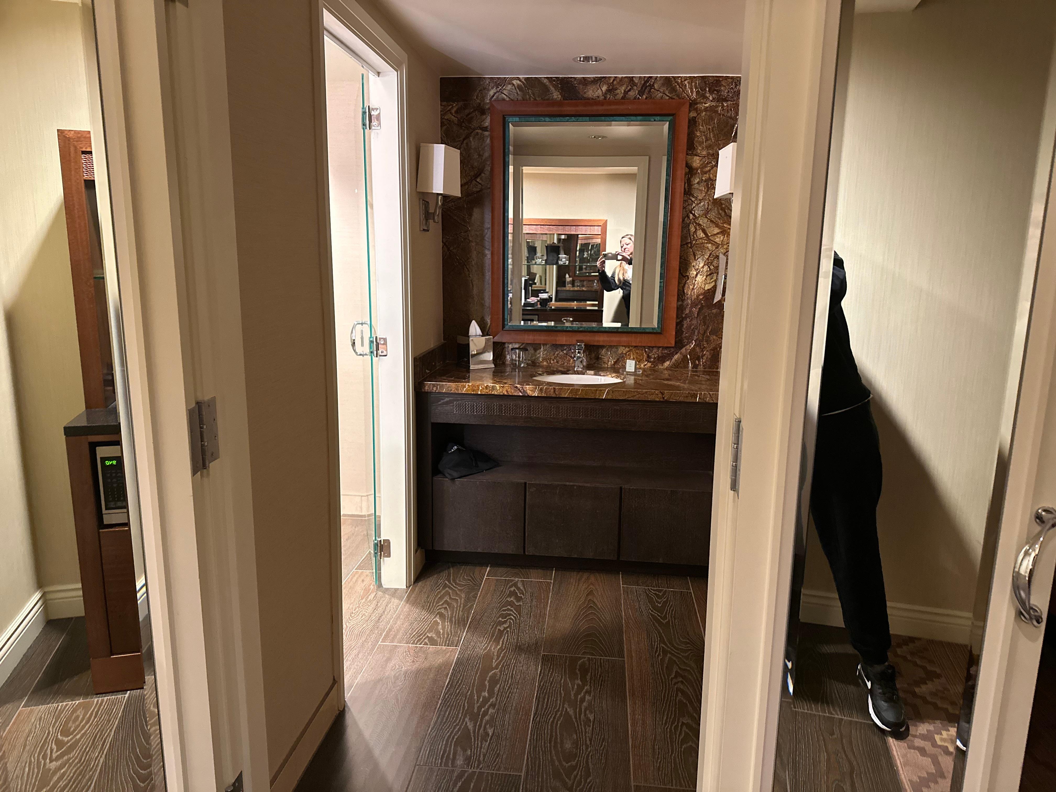 First vanity/sink area by bathroom