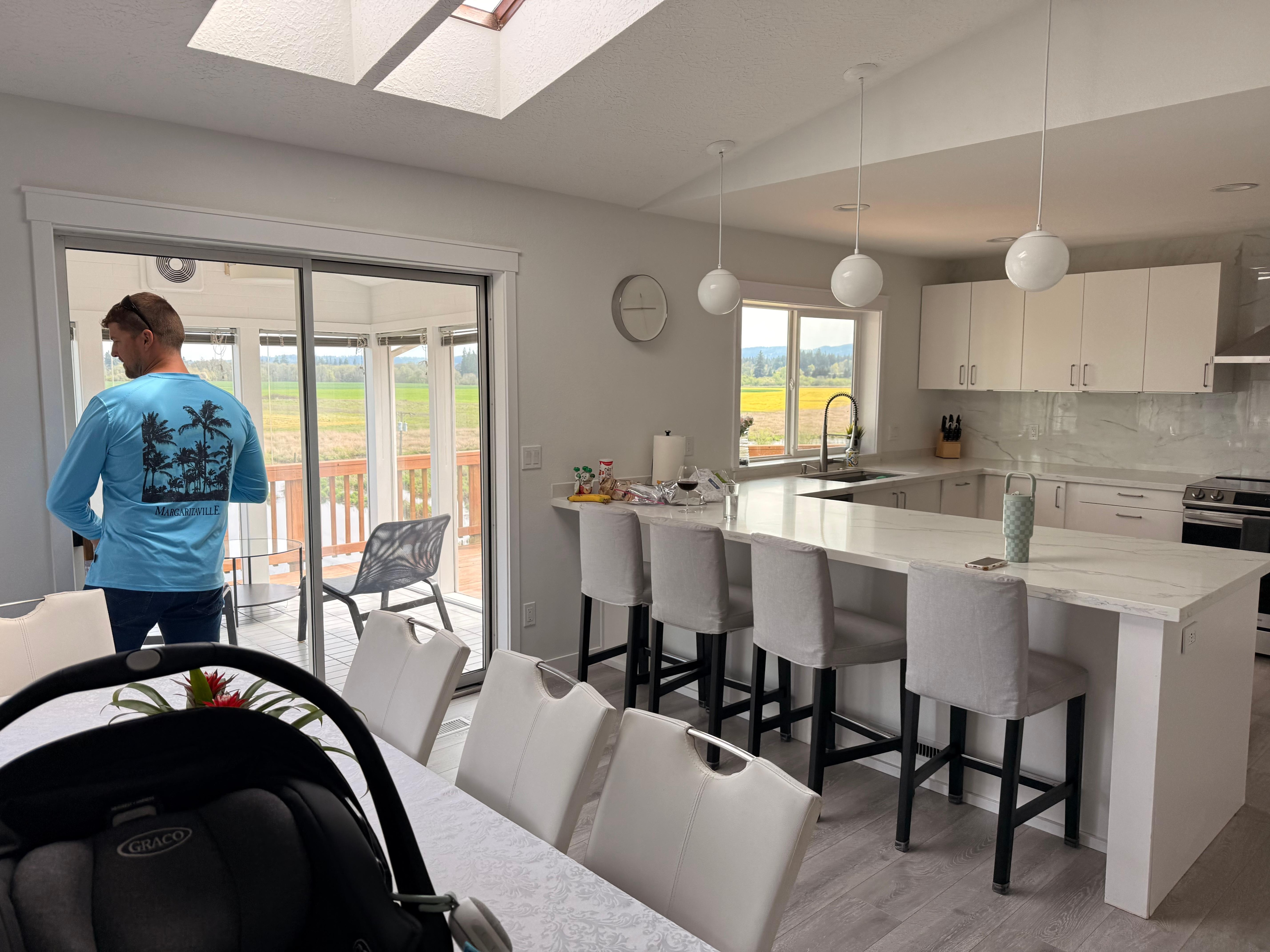 living to kitchen and sun room....