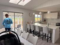 living to kitchen and sun room....