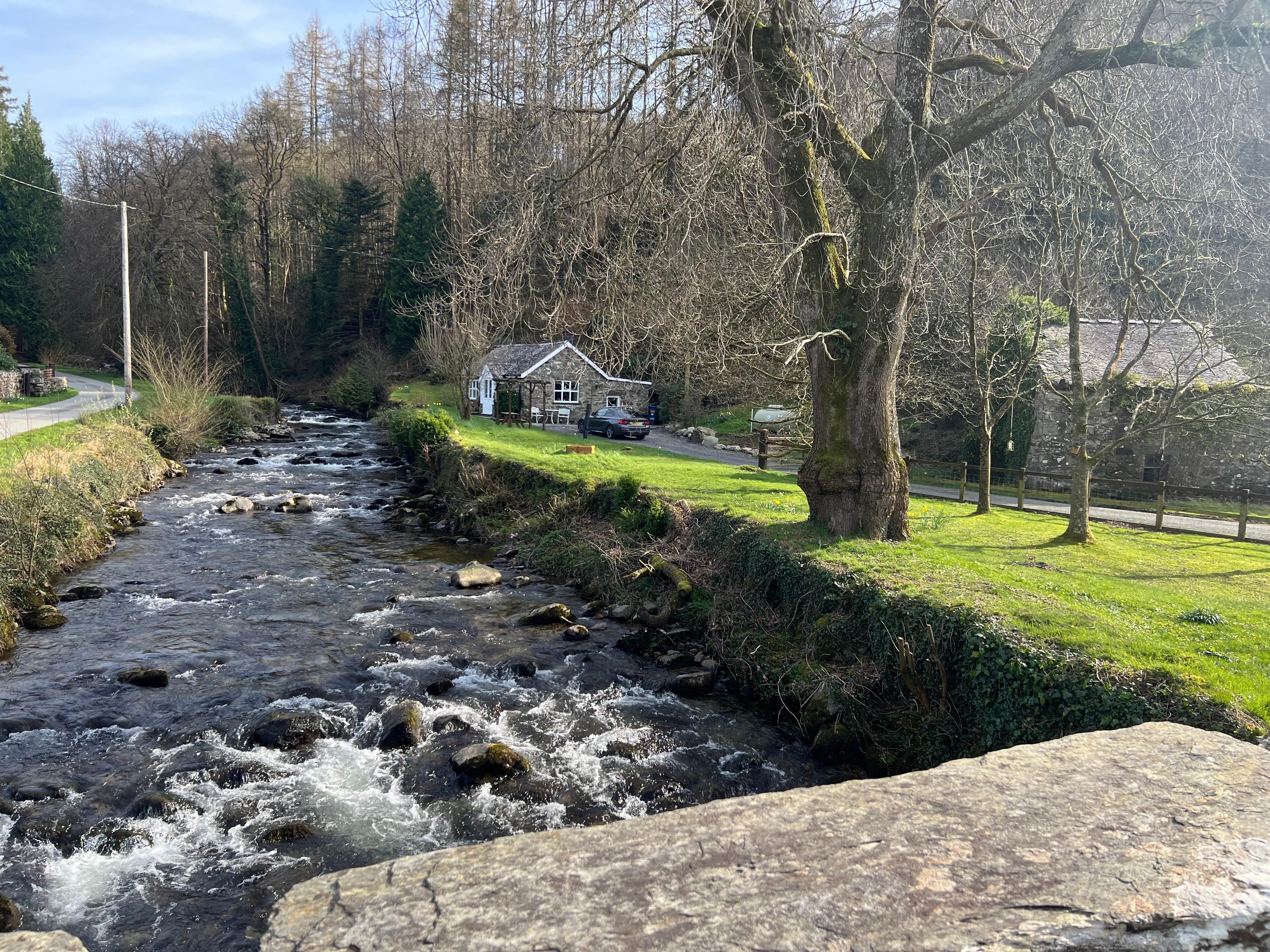 The cottage from bridge over Gwynant river.