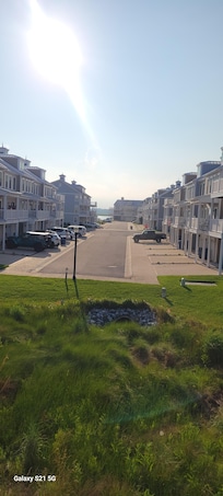 Deck view lookinh towards the pool and bay