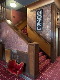 There is an elevator but I like to take the stairs to maybe bump into the Lady in Red!