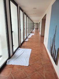 Windows leaking and buckets collecting rainwater