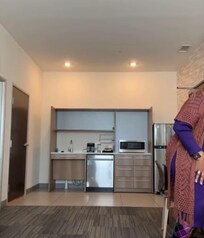 The kitchen area of the room