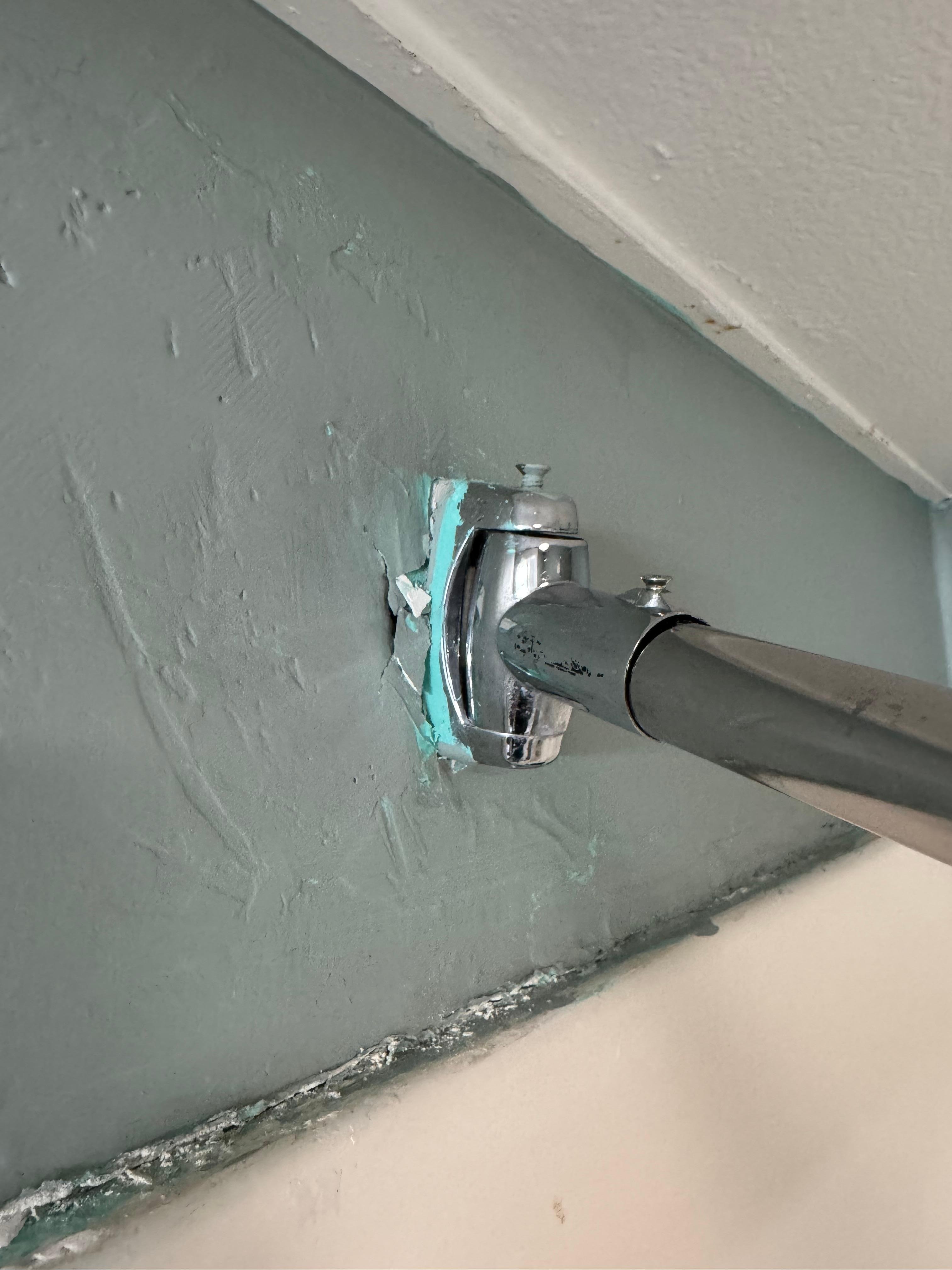 Shower curtain rod failing off the wall. 