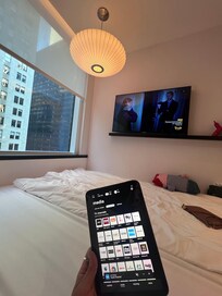 Room control to manage TV and lighting