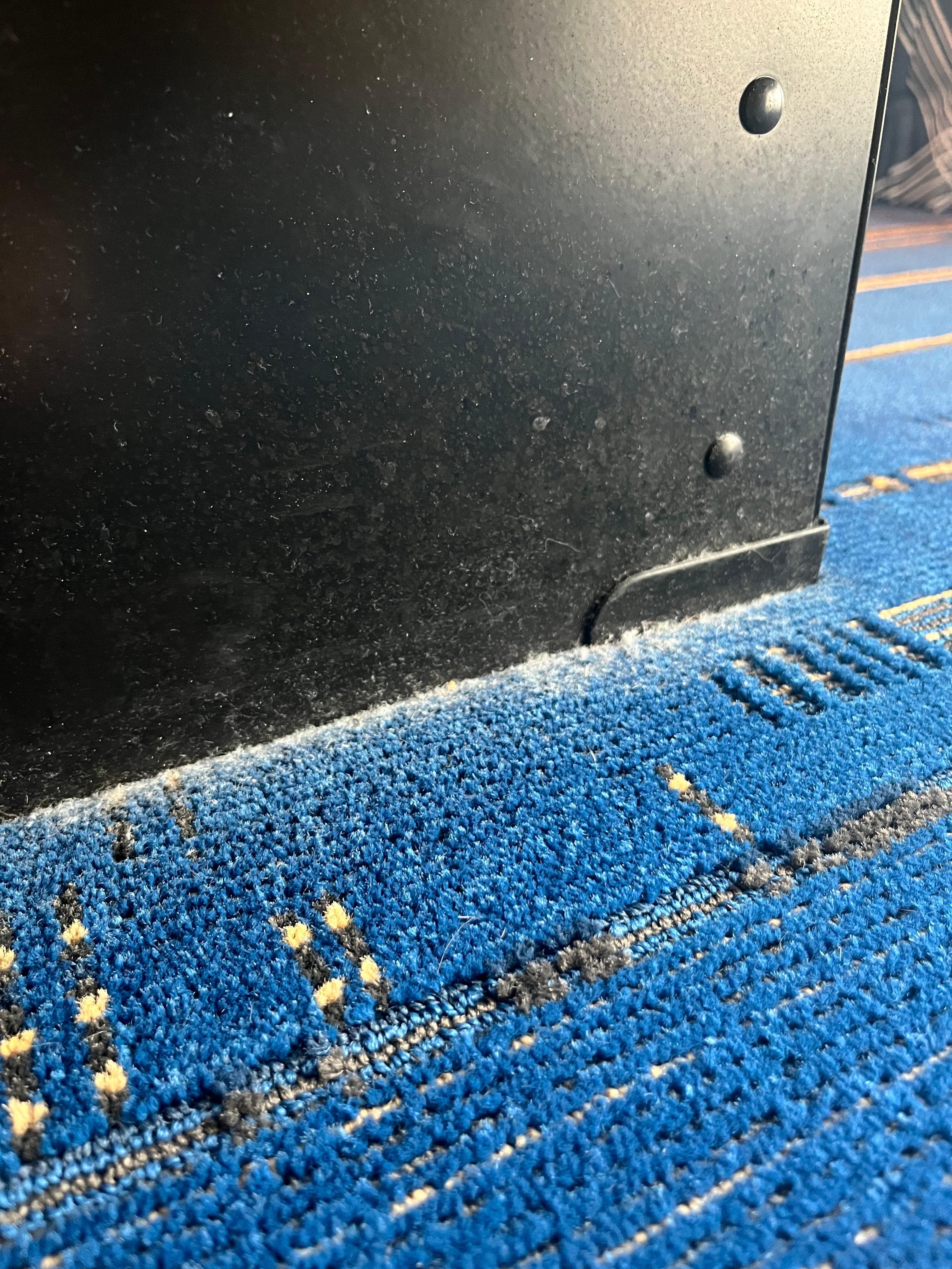 All the carpets near furniture and walls looked like this. Definitely needs a deep clean!