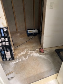 Bottom level room next to “gym”