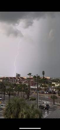 Watching beautiful storms from deck