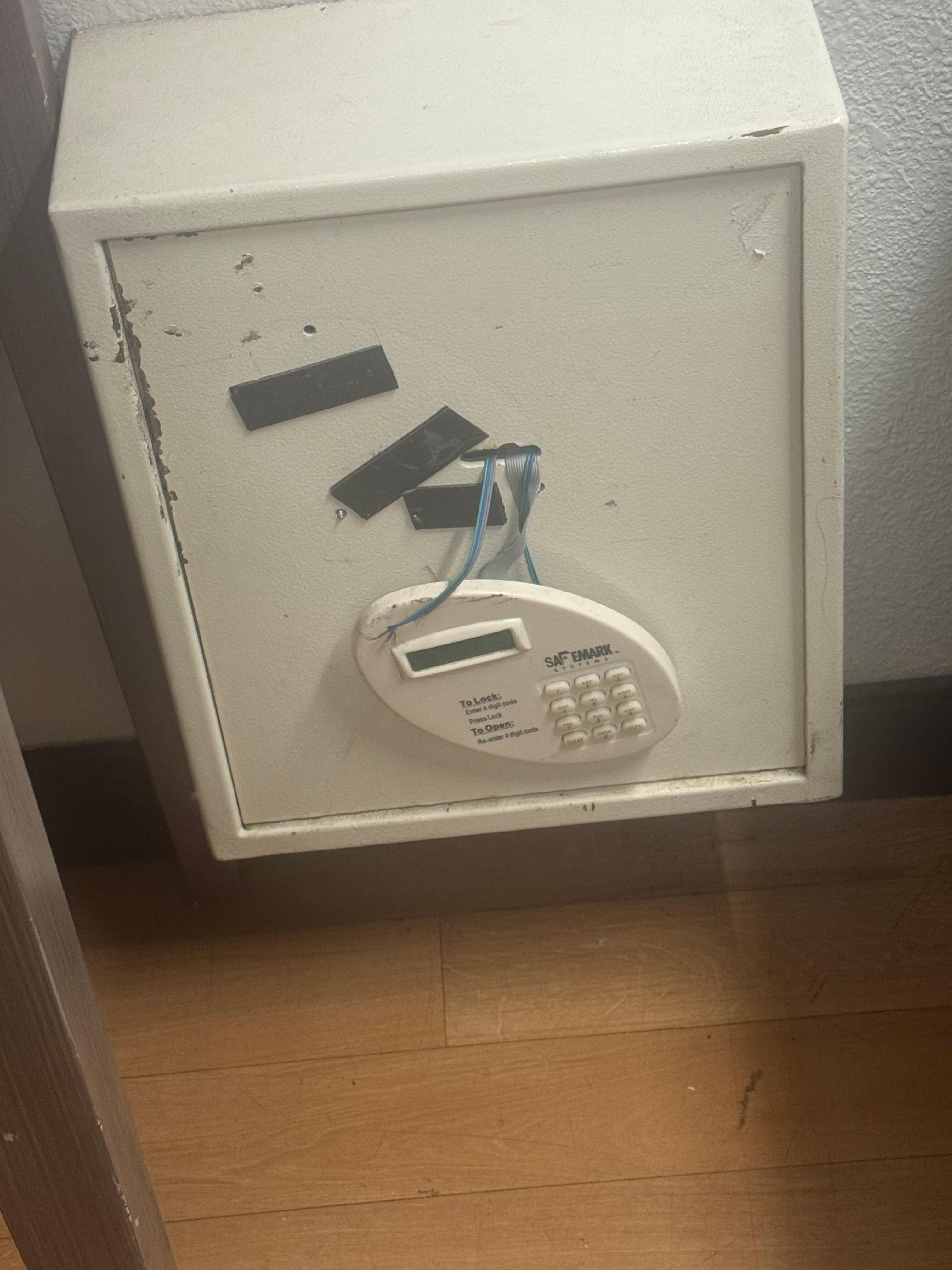 What is this ? And why are wires taped and hanging out ? 