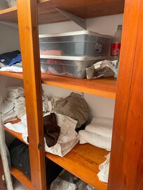 Closet with owners clothes