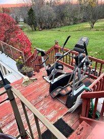 On the way to entrance, rusted old gym & yard equipment