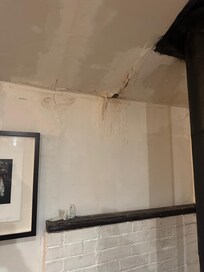 hole in ceiling which lets in draft