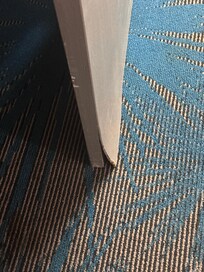 Bathroom door water damage and splitting in two. NOT able to move easy or close.