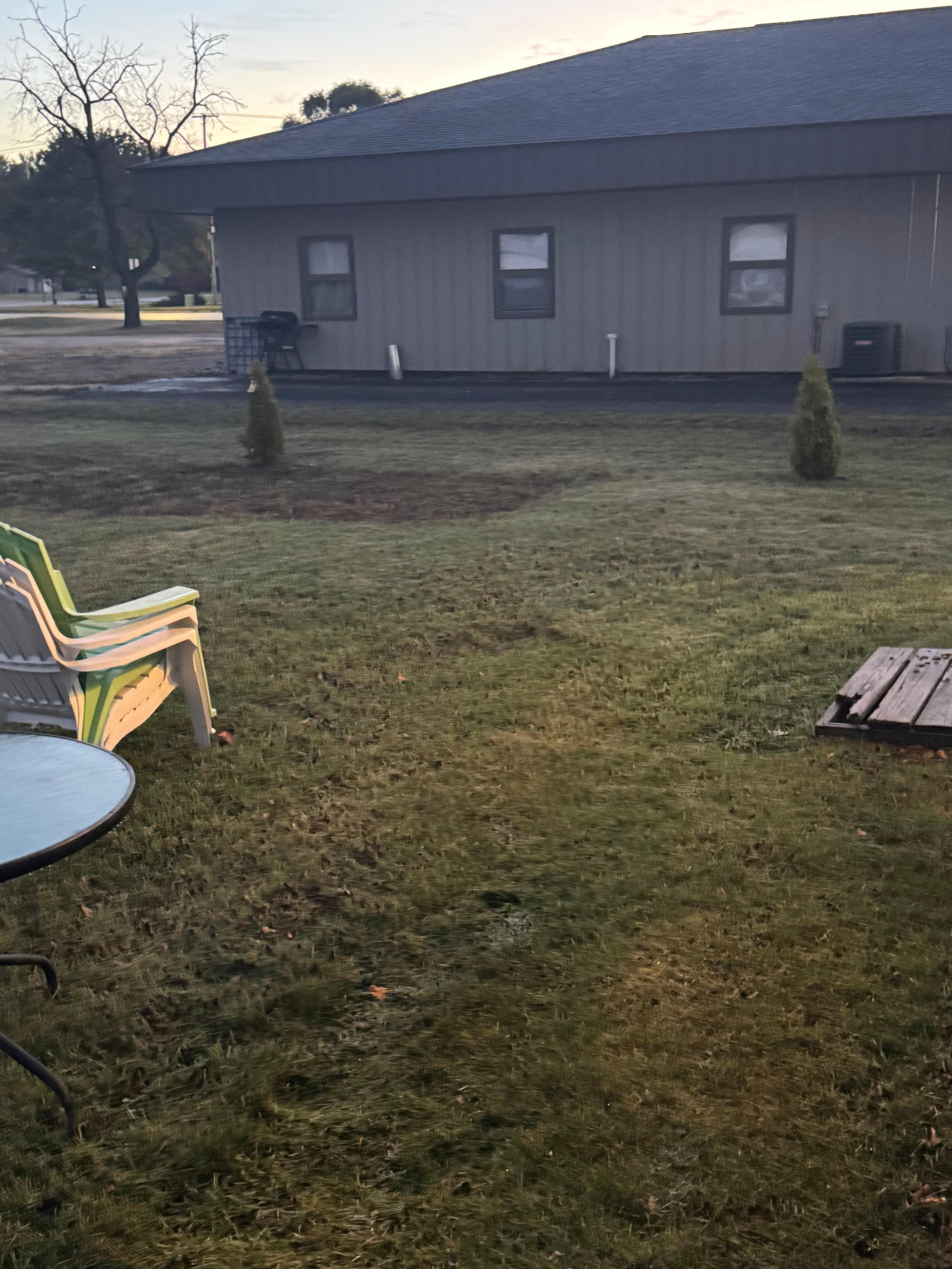 Right behind a strip mall with back offices directly facing house