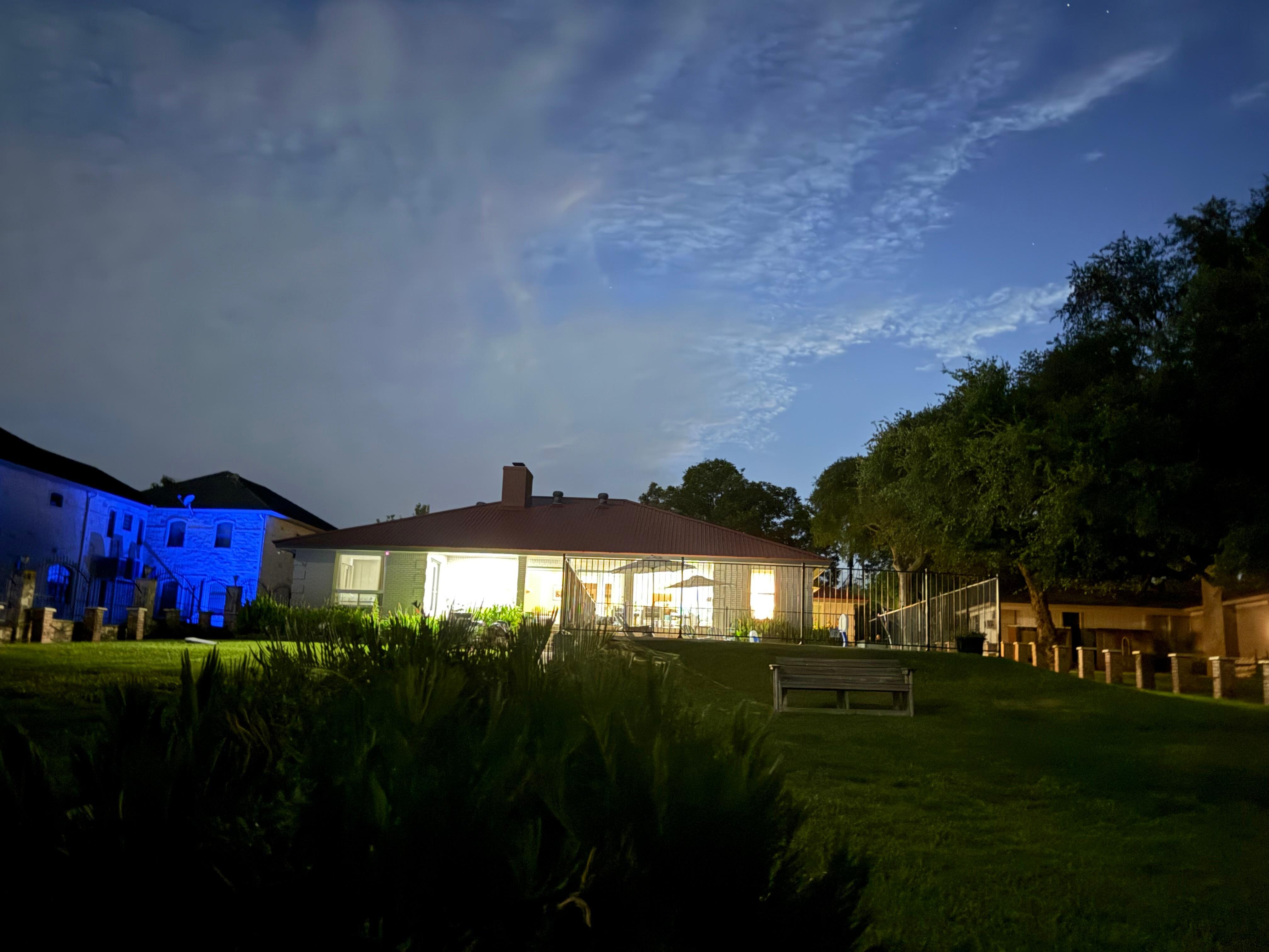 Night photo looking at the house from the dock