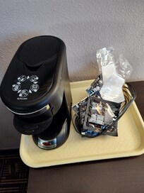 Plenty of coffee in the room. Just no coffee cups left in the room to drink it out of.