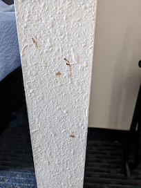 "Mysterious" spots on bedroom wall.