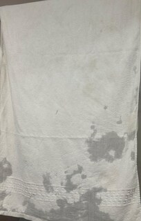 Estado da toalha de banho.