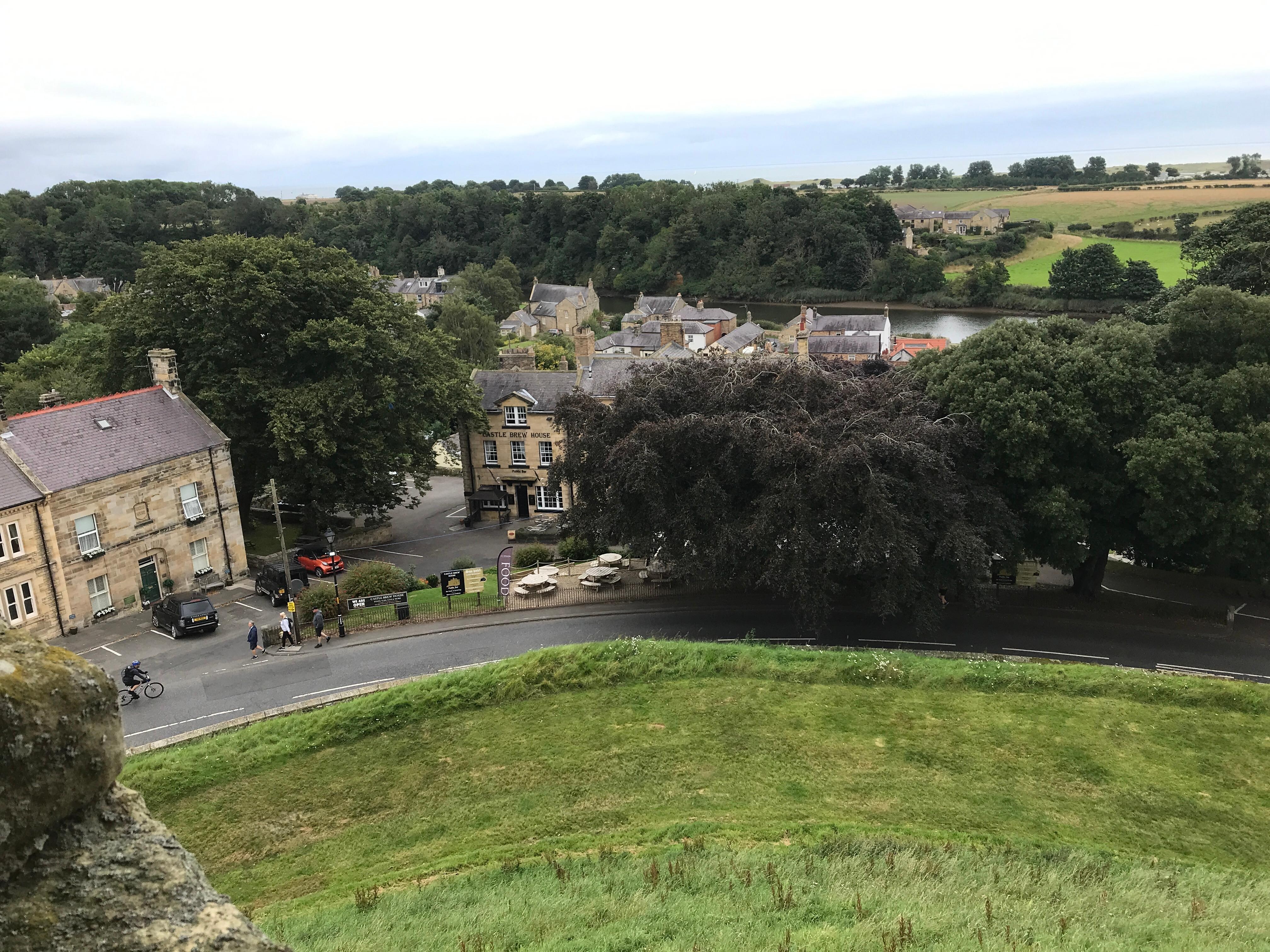View from the castle of the hotel and pub between the castle and the river 