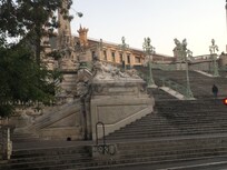 Opposit the hotel, stairs to the train station.