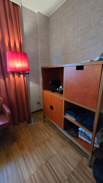 Closet for clothes with safe and coffee machine