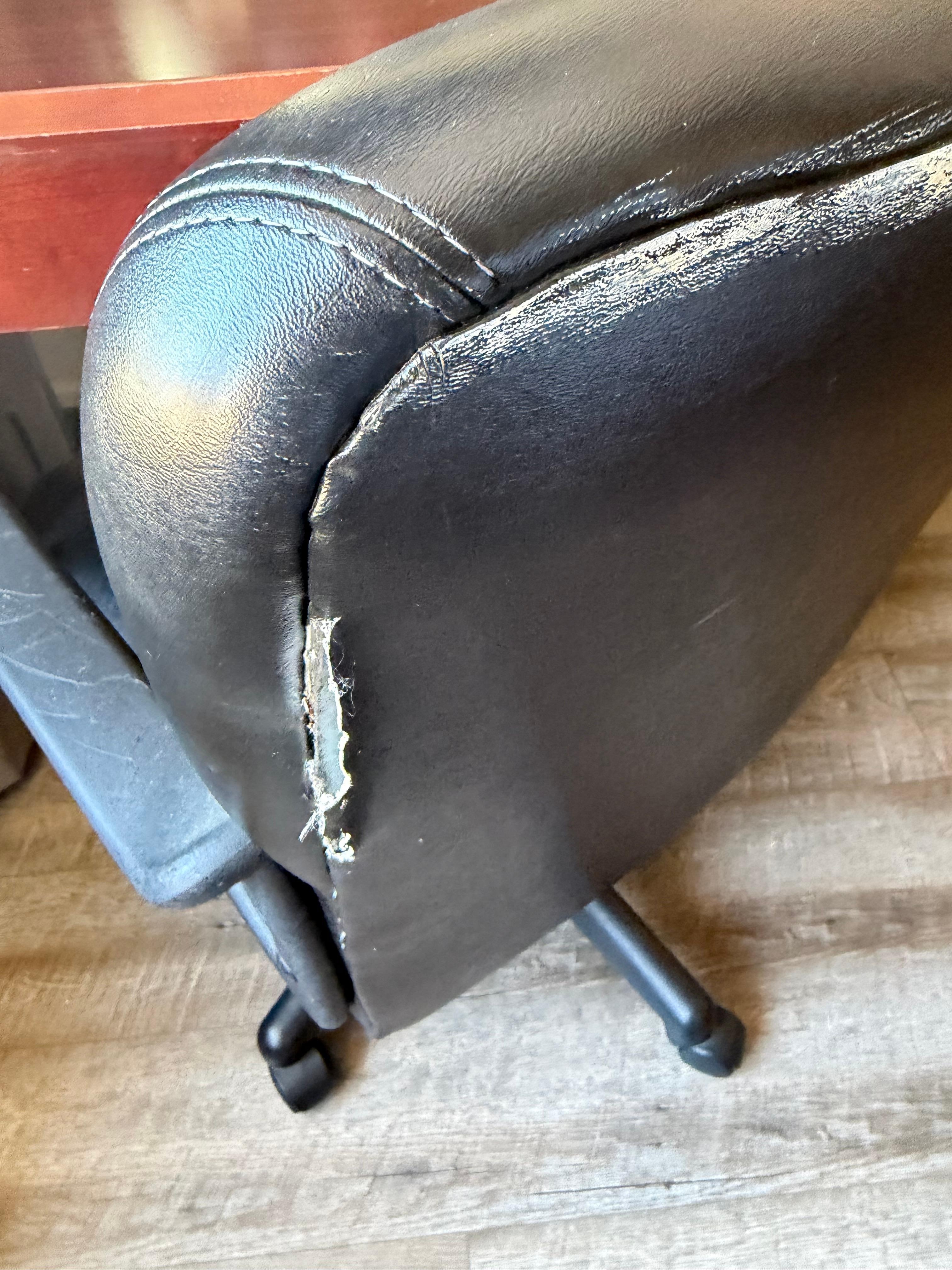 Ripped chair in room 