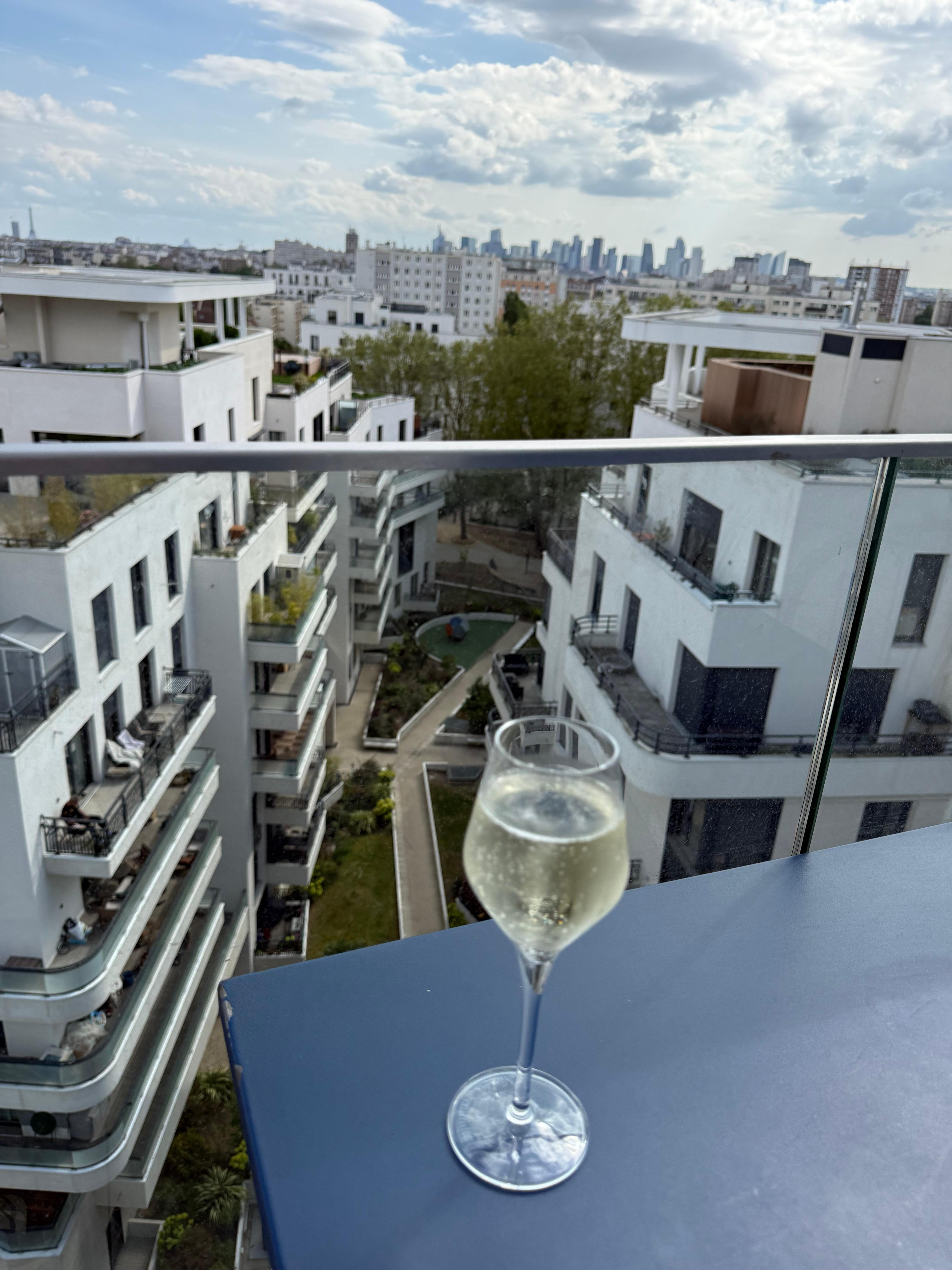 Rooftop Bar and Restaurant view is to a residential building 
