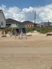 Cabin is the cute coral-colored one. Taken from beach access walk!