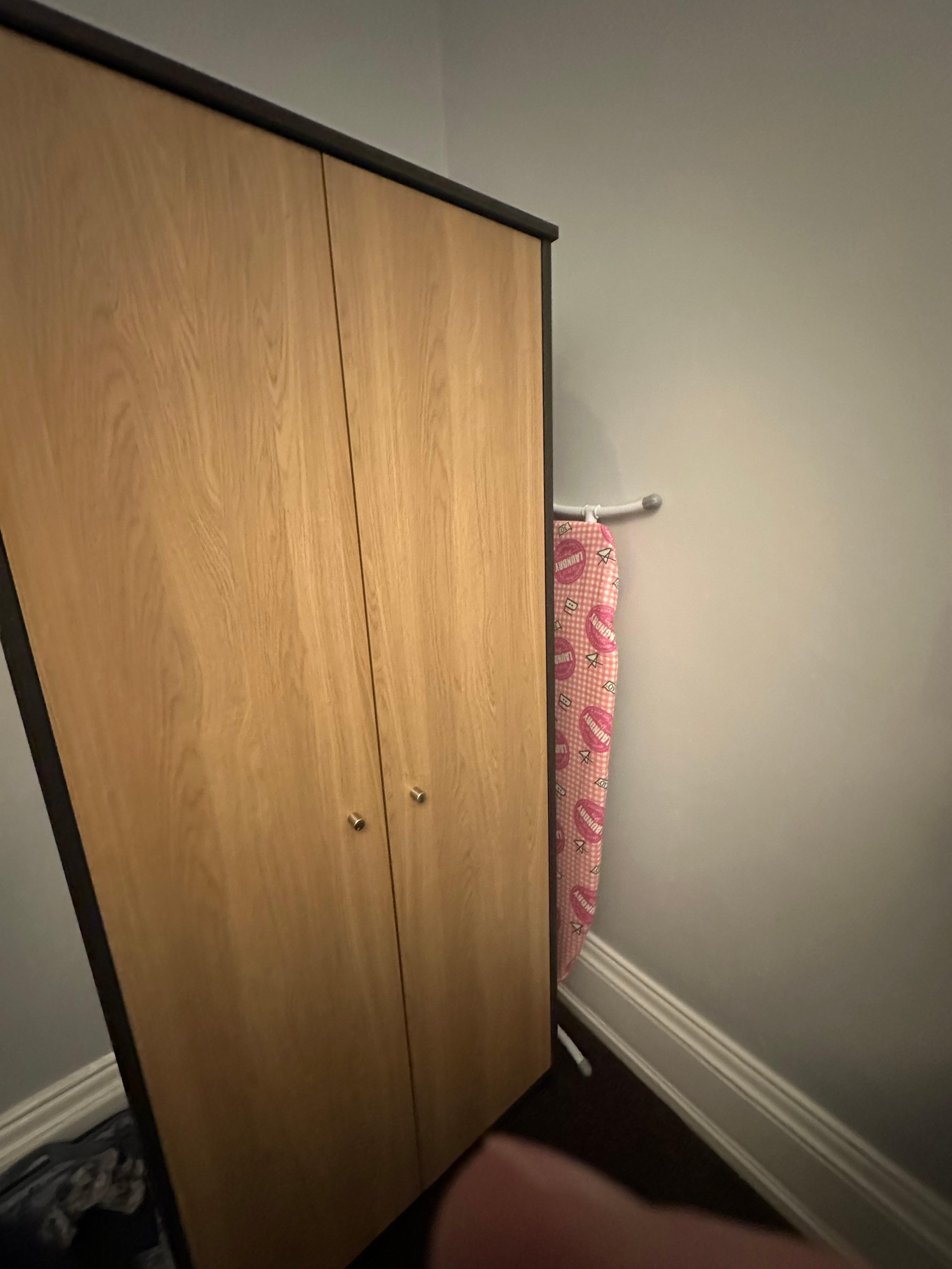 Budget wardrobe and ironing board. More student digs that 4 star. 