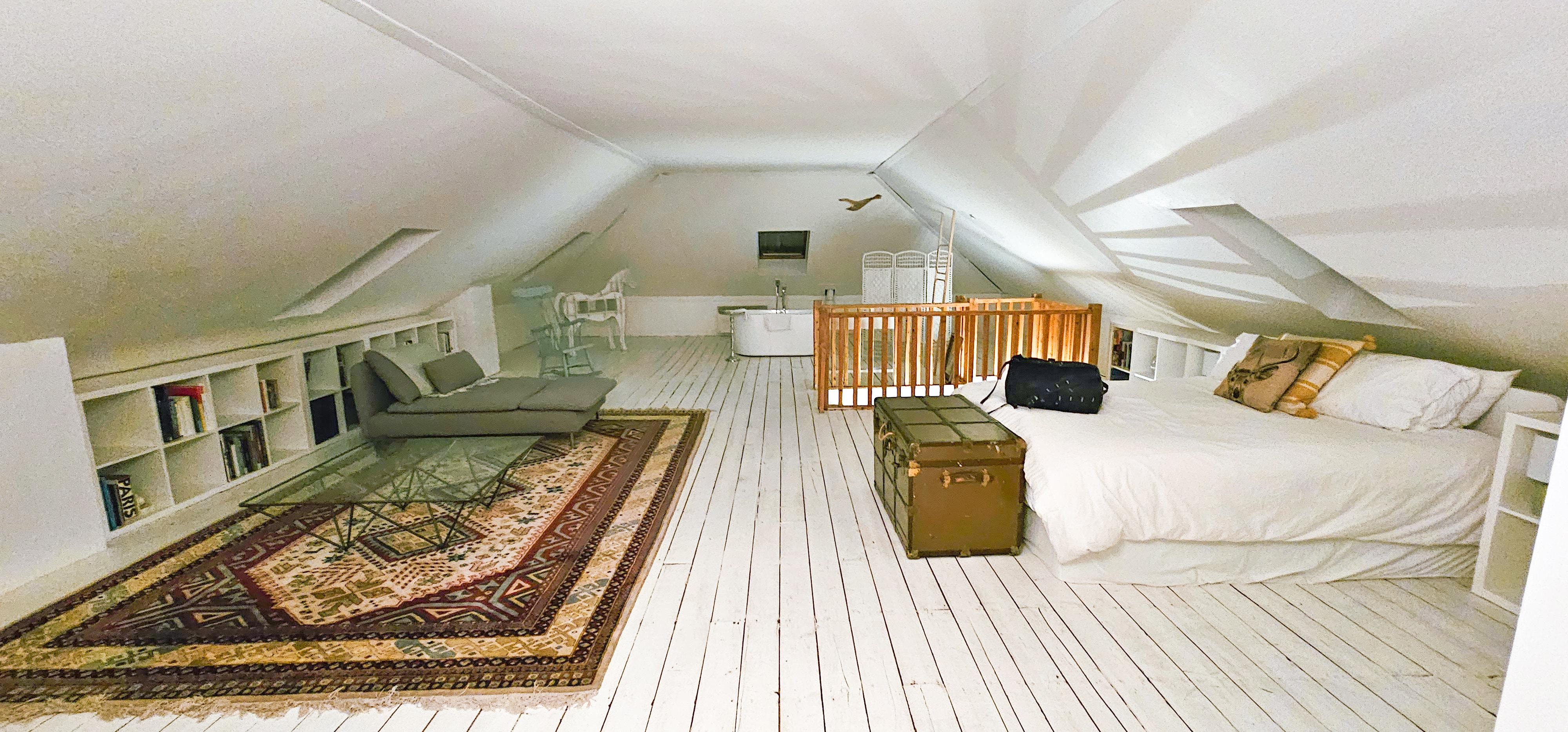 Upstairs bedroom is an open concept with plenty of room.  Bed, chaise lounge, bathtub and toilet.  No sink just so future viewers know.