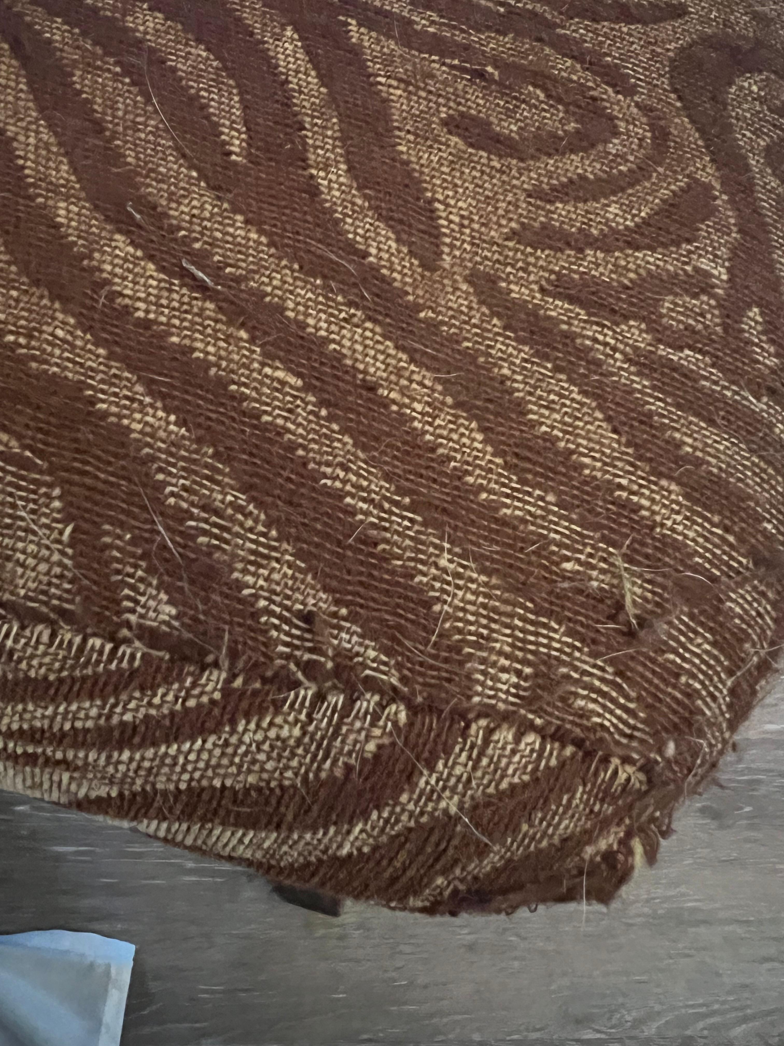 Chair in living room with dog hair. 