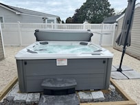New, clean, and spacious hot tub.