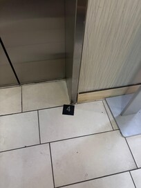 Floor numbers falling off the walls