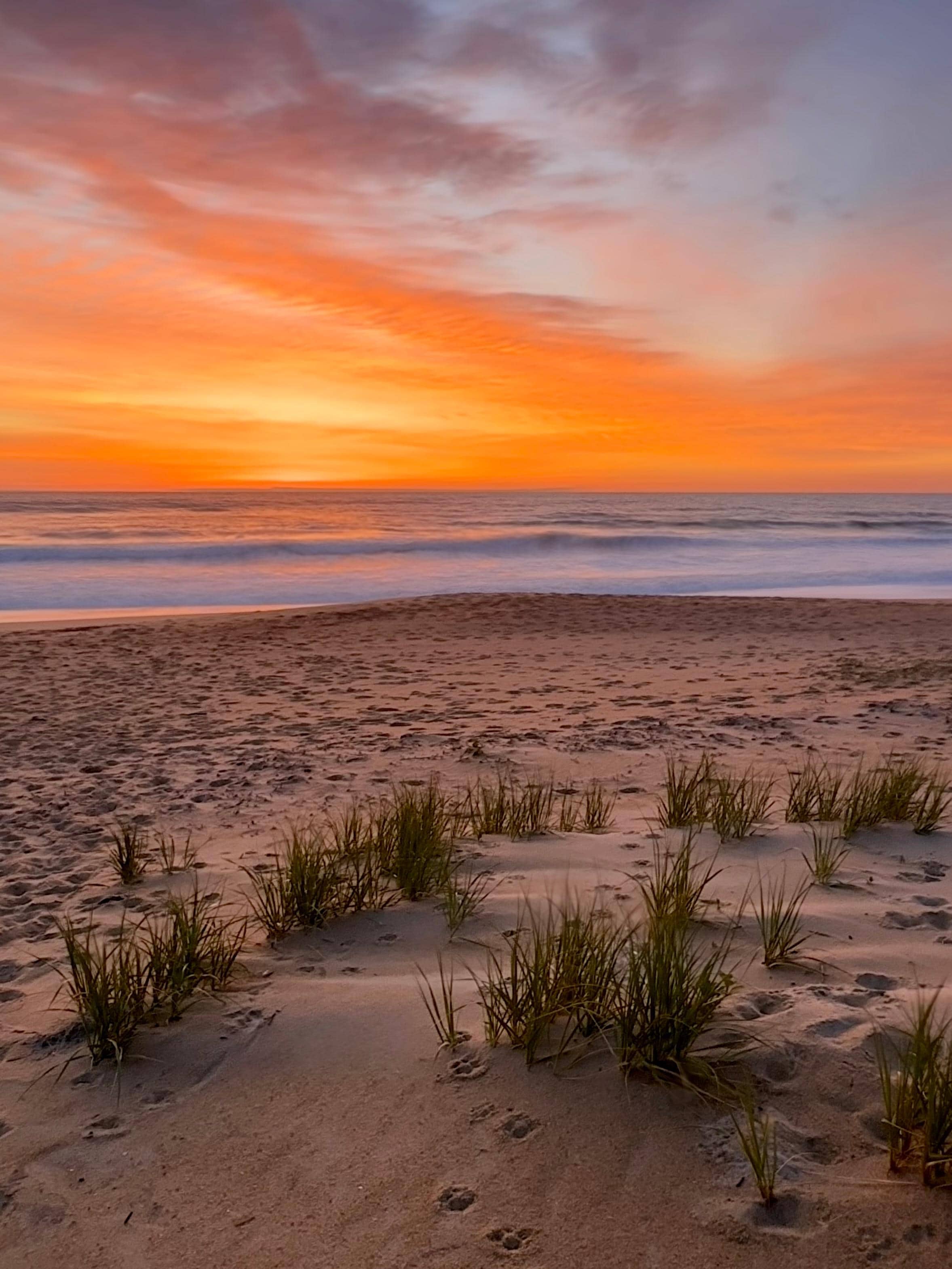 The beach at sunrise. Steps from the deck.