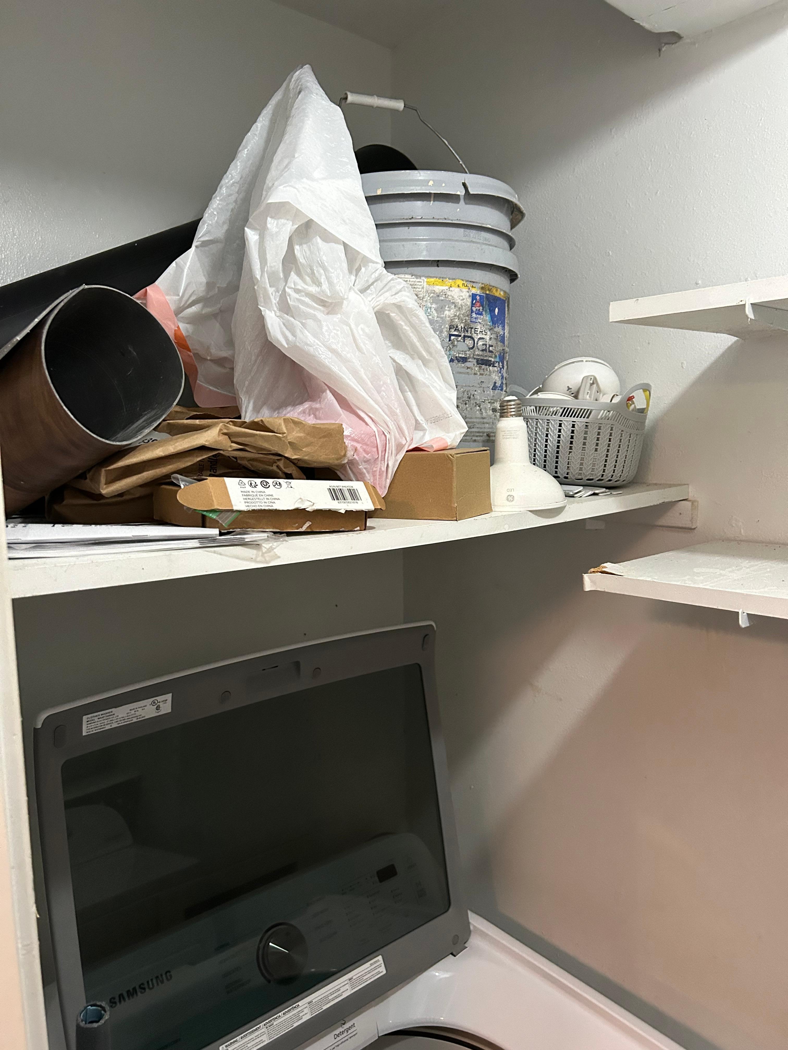 Paint and junk in Laundry room