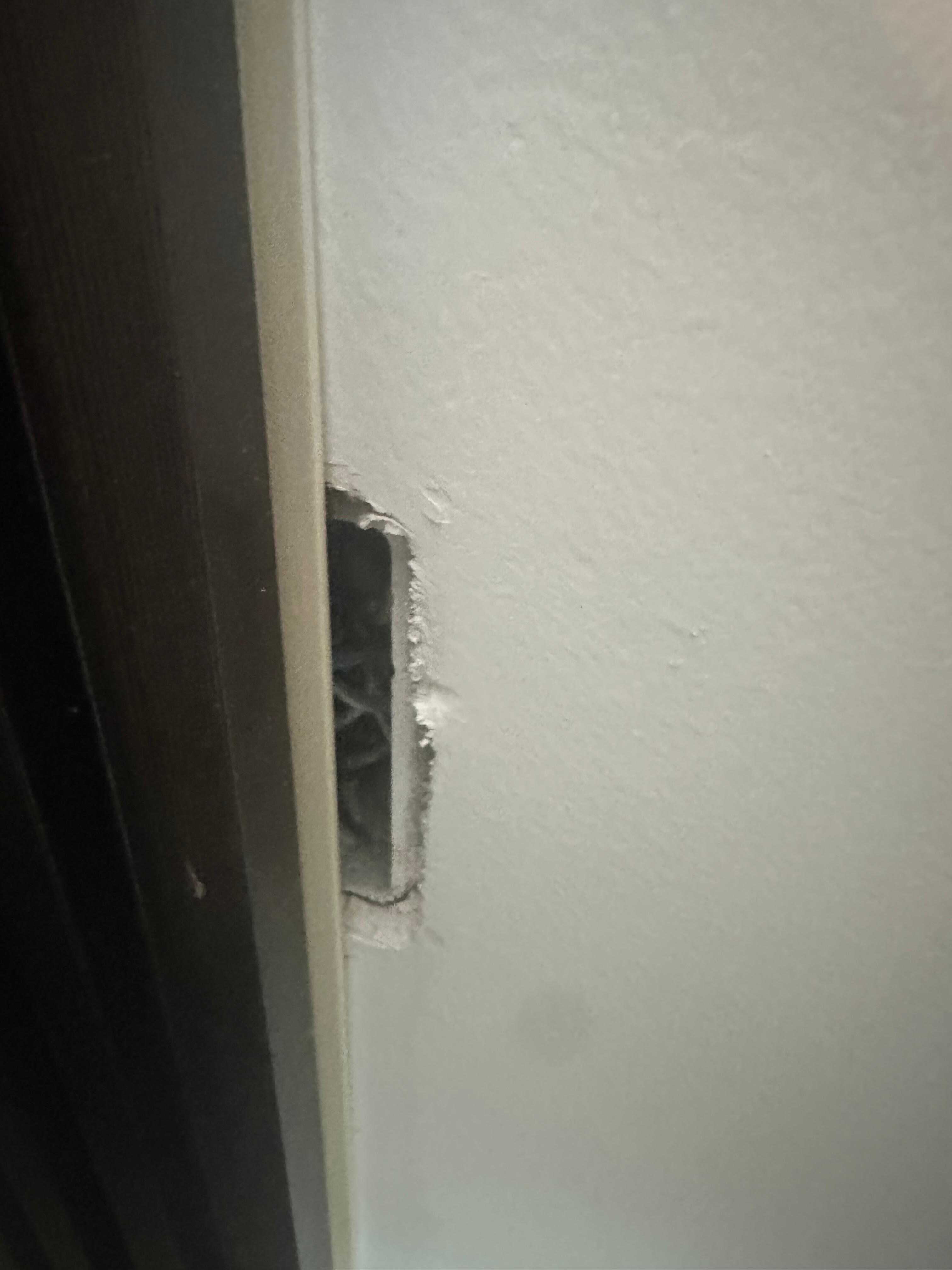 Open wires next to bed