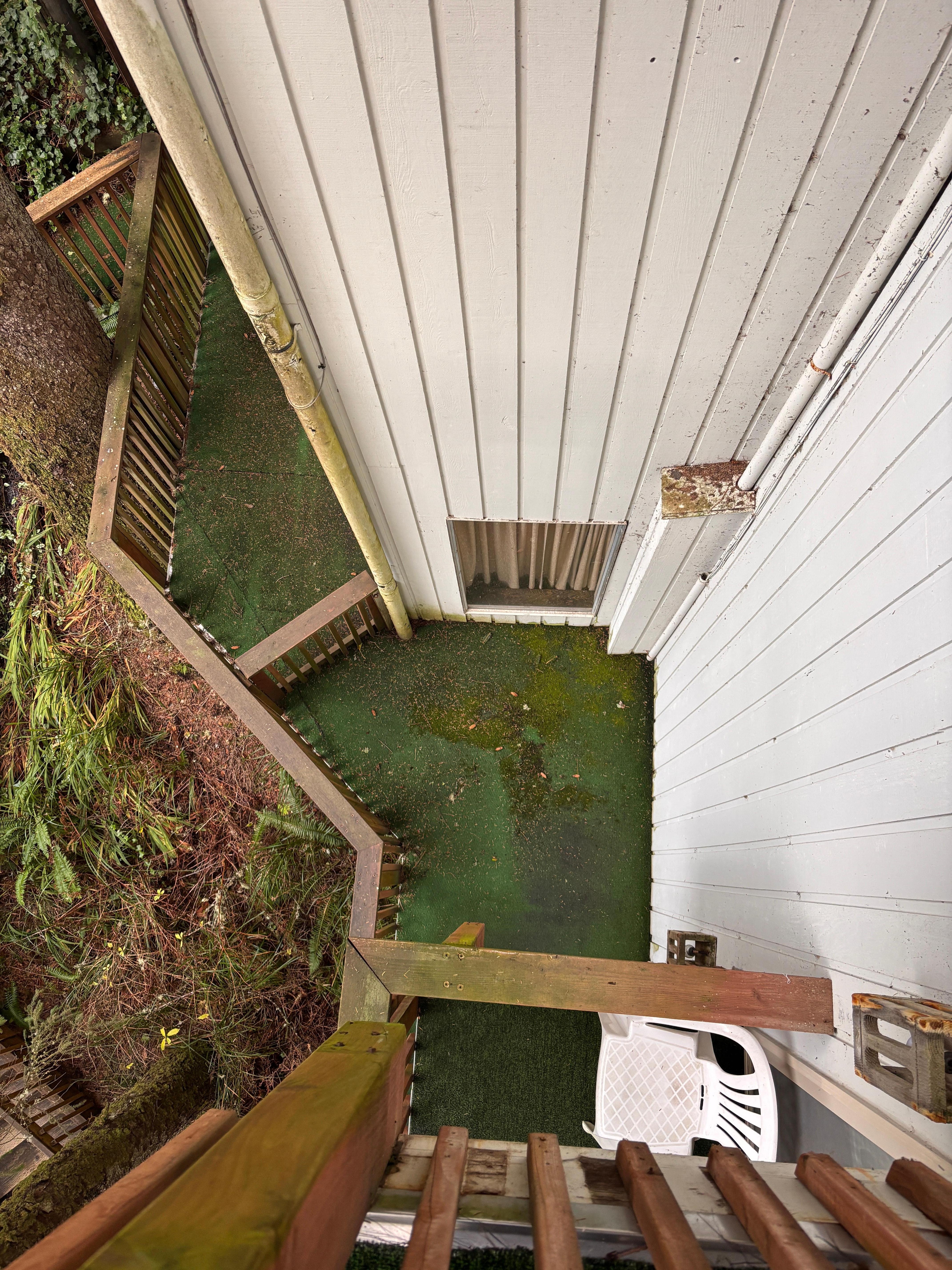 Rotten exterior balconies, unsafe to stand on. 