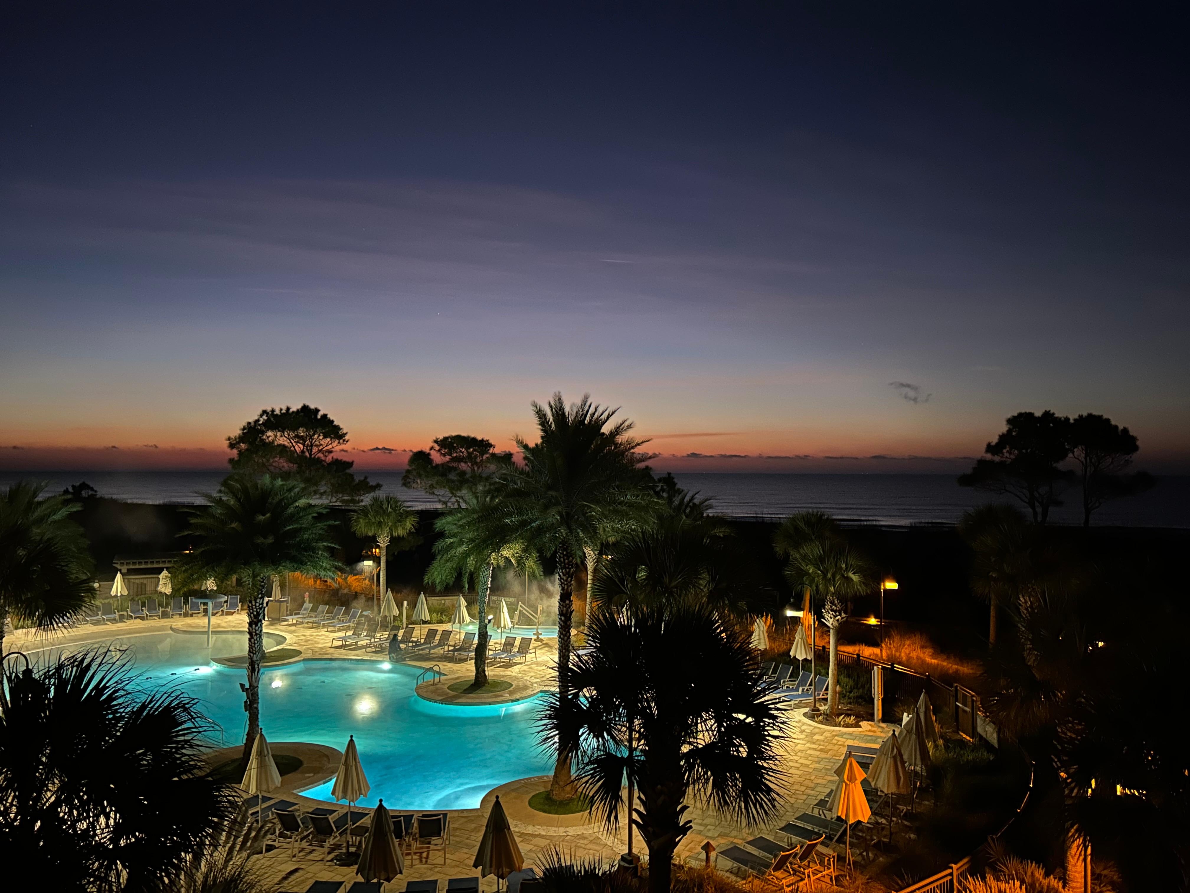 Beginning of sunrise captured from balcony before a morning walk on the beach. 