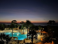 Beginning of sunrise captured from balcony before a morning walk on the beach.