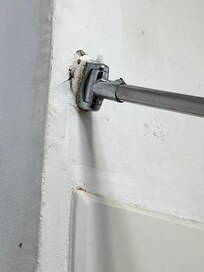 Shower curtain was coming off wall and put up the next day