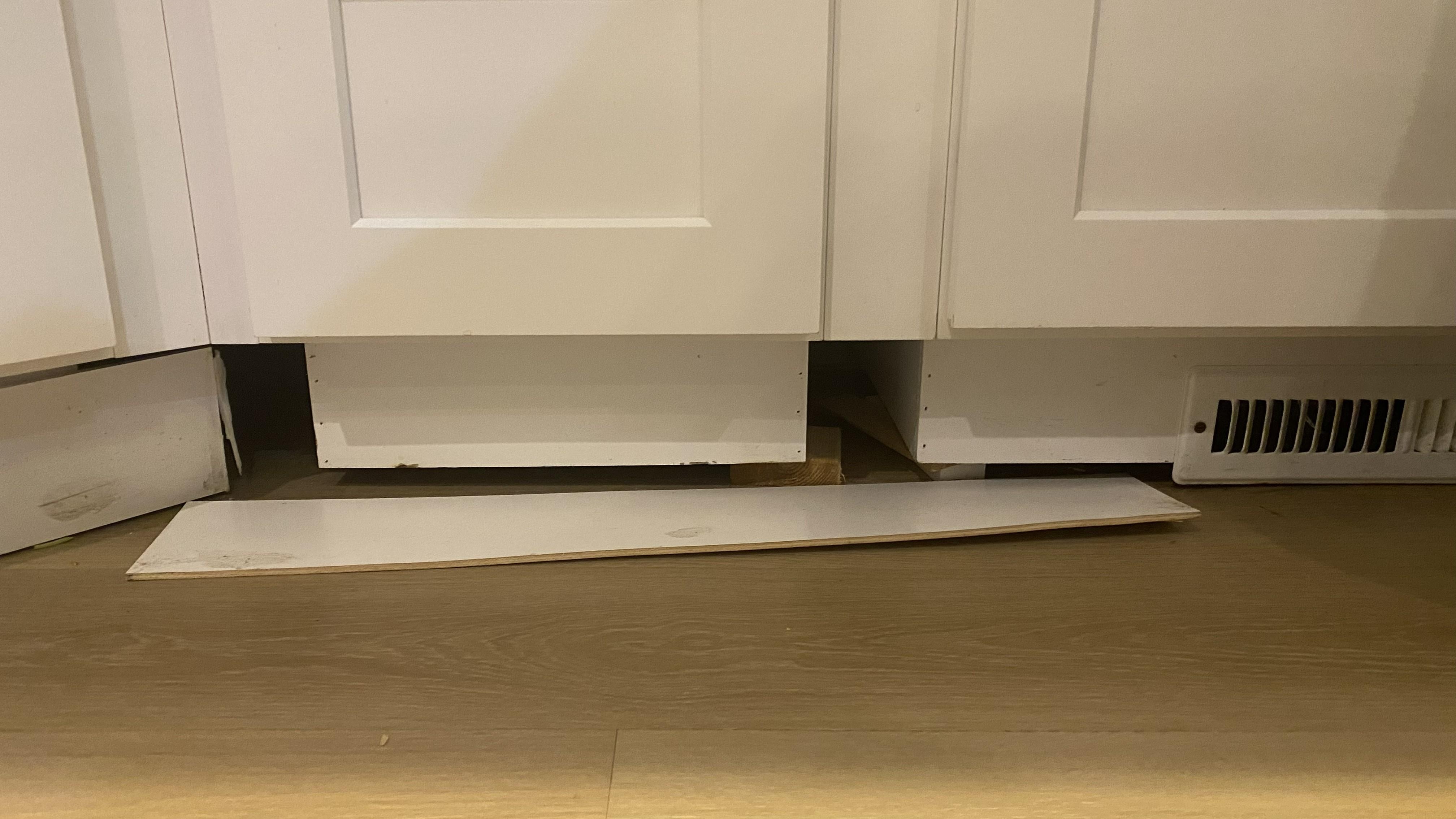The kitchen trim is not attached and is falling over constantly.