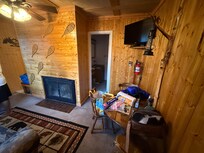 Living room area and bathroom