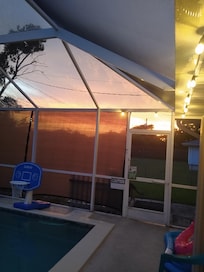 Sunset looking out of pool area