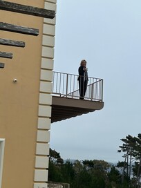 My wife on our balcony!