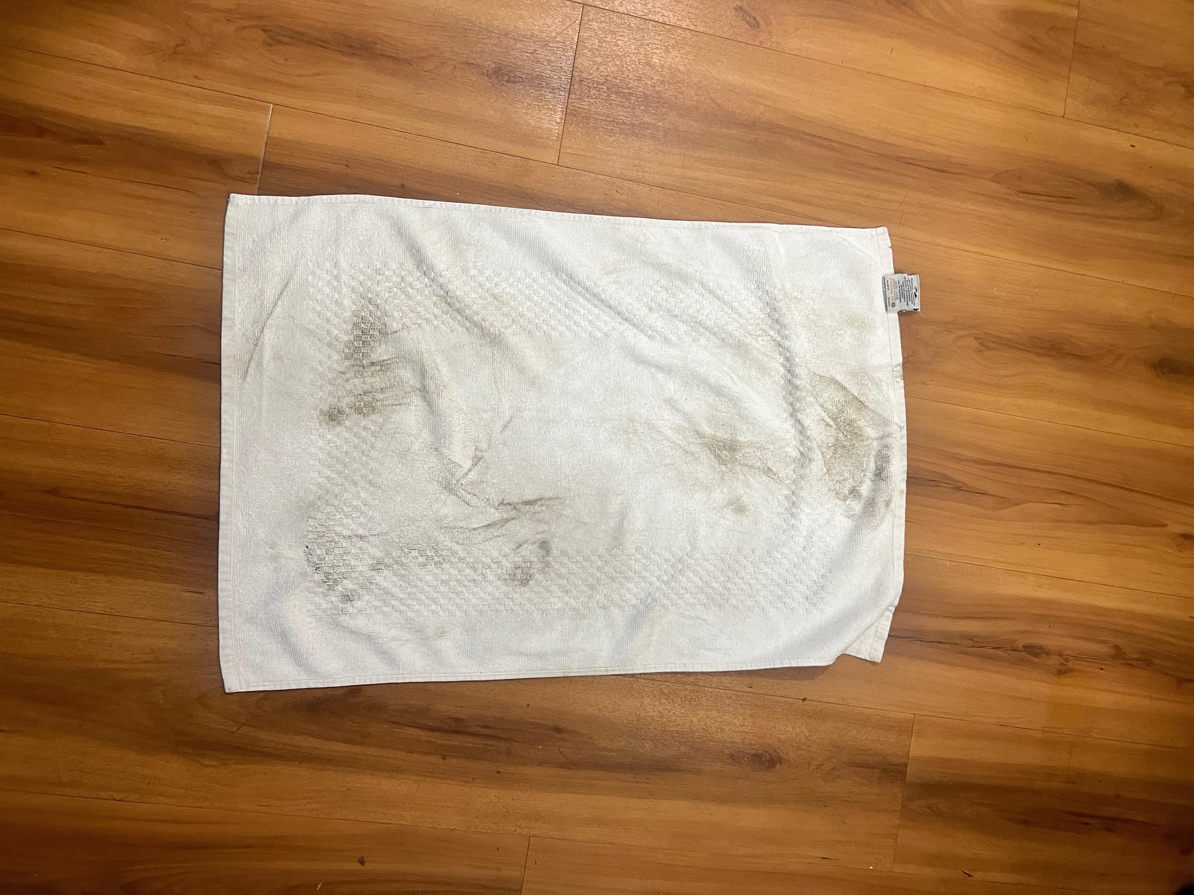 Dirty floors throughout the room. 